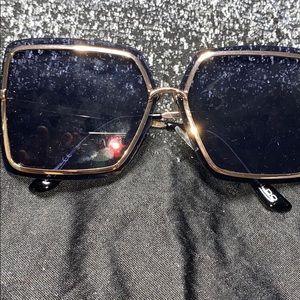 Black with gold trimming sunglasses
